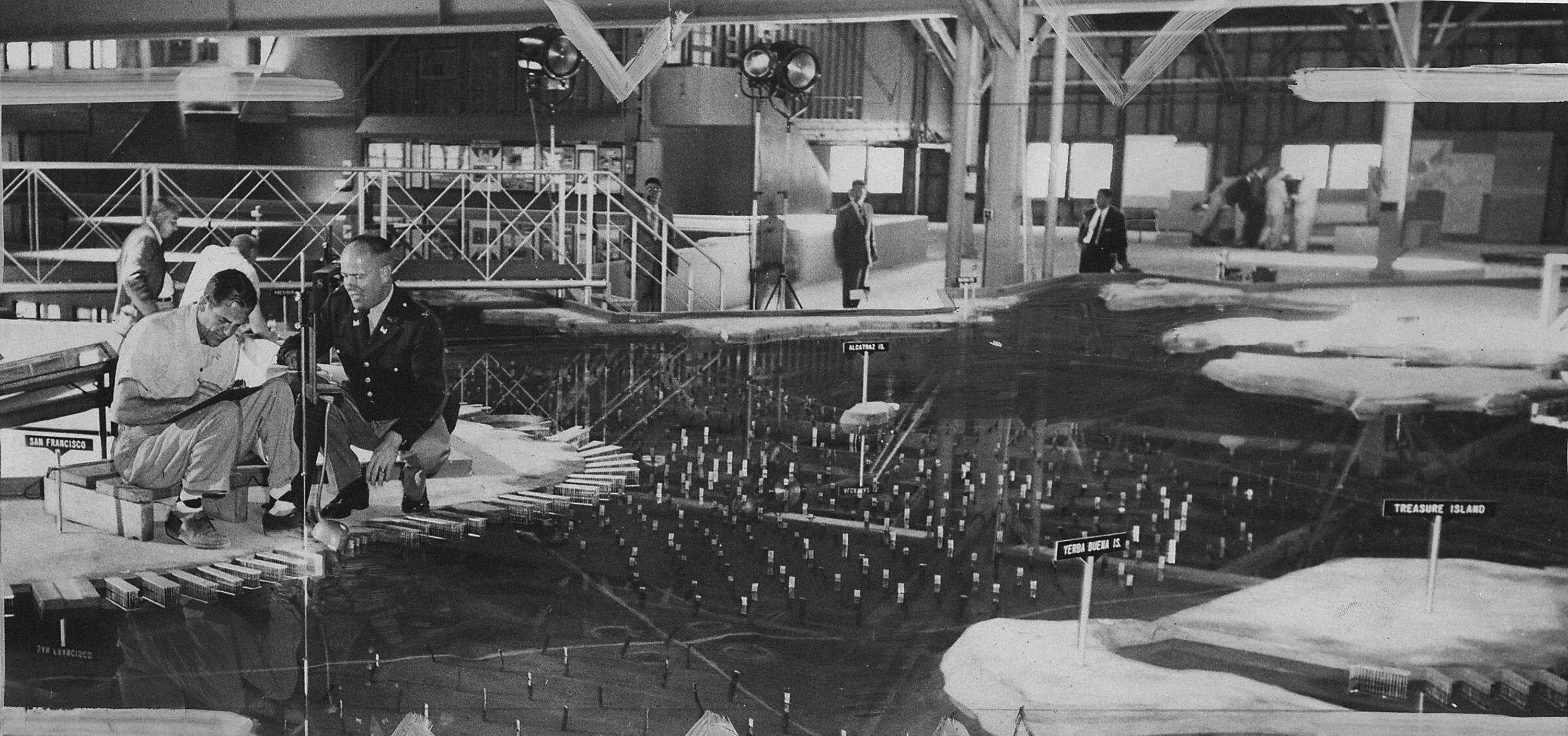 John Easterby, engineering specialist, (left), and Colonel John A Graf, check readings on the Bay Model, June 12 1957 (SF Chronicle)